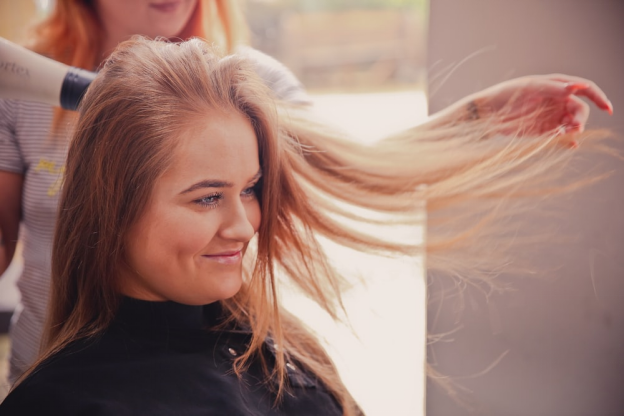 A Woman Getting A Haircut
