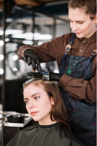 woman getting her hair done at a salon